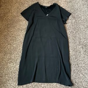 Universal Standard black v-neck dress.